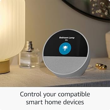 Amazon Echo Spot controlling smart home devices with Alexa, shown turning on a bedroom lamp.